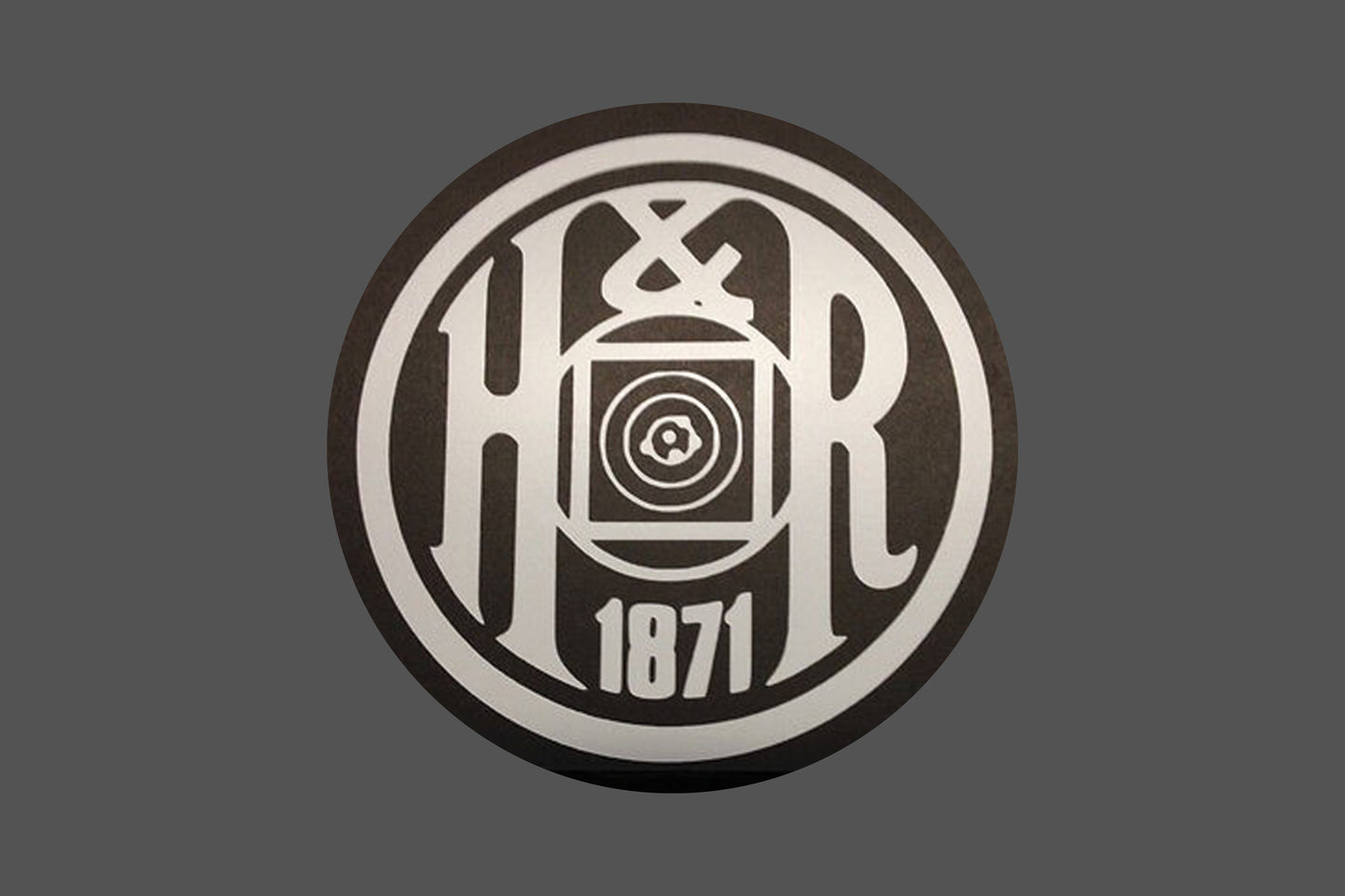 Round Canvas Frame with "H&R Gun Emblem" Image